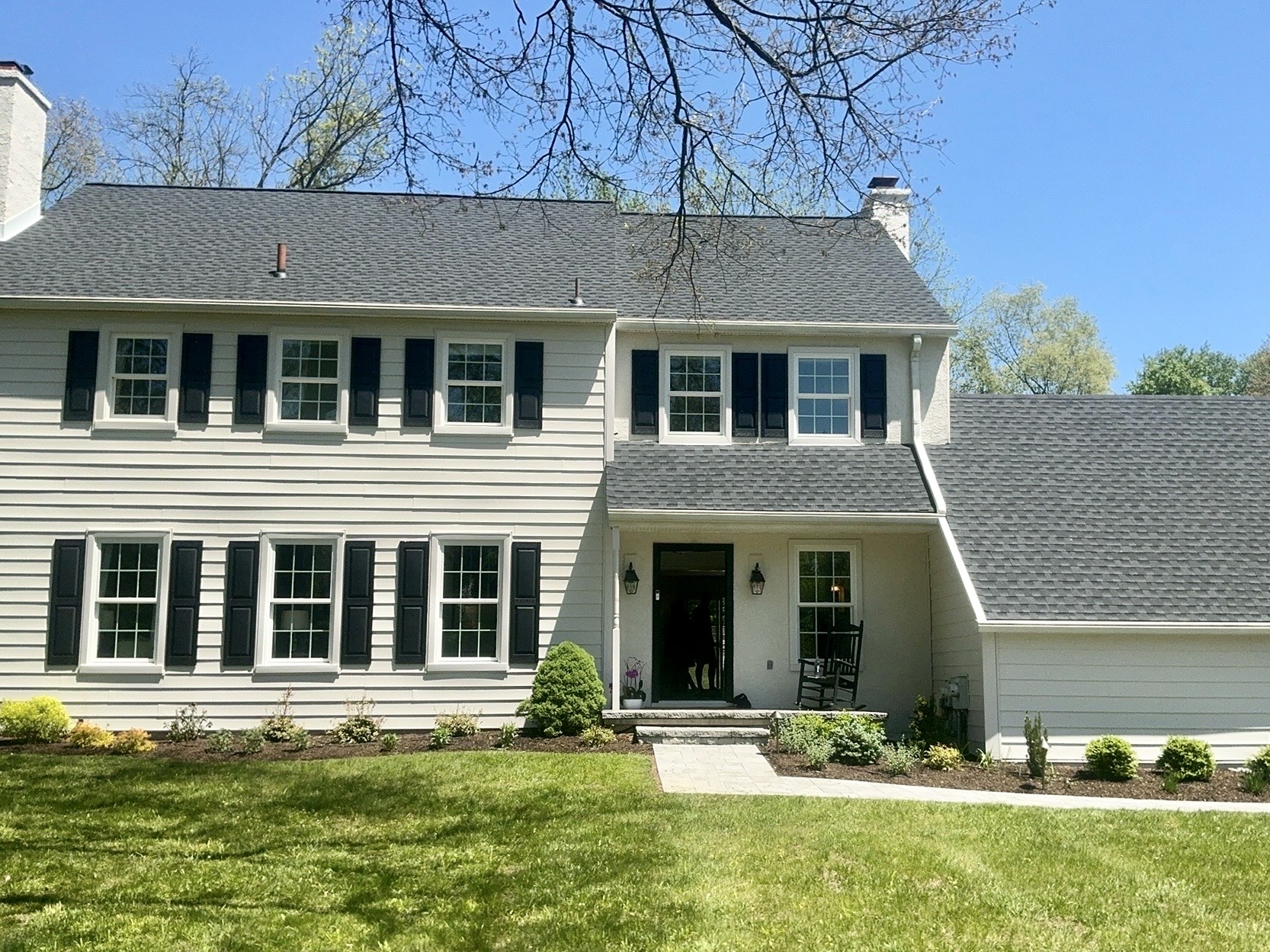 Home inspection by Todd Denney — clapboard colonial with black shutters and gambrel roofline in Devon, Pennsylvania