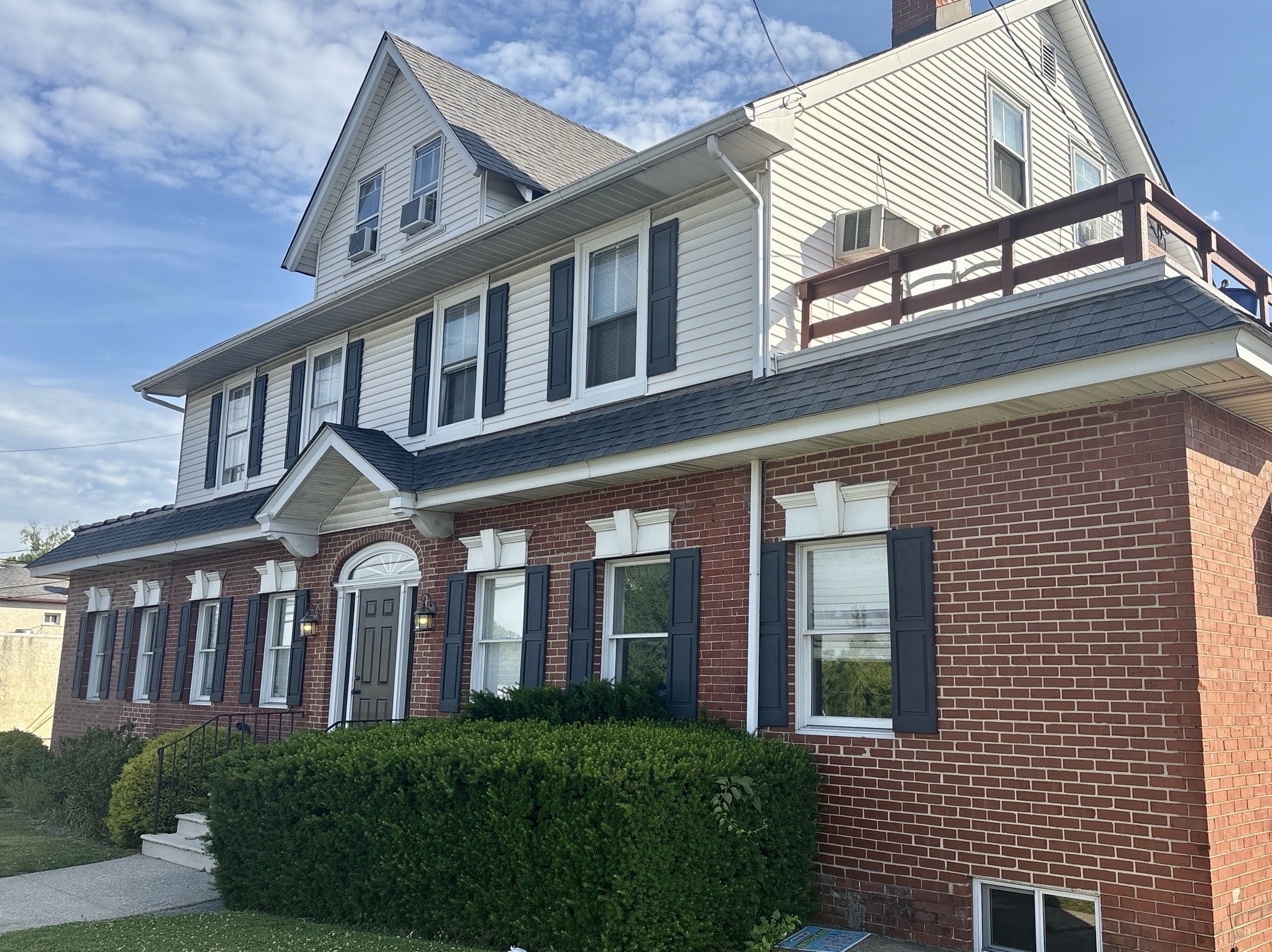 Home inspection by Nick Ostrowski — three-story historic home with brick base, frame upper and rooftop deck in Norristown, Pennsylvania