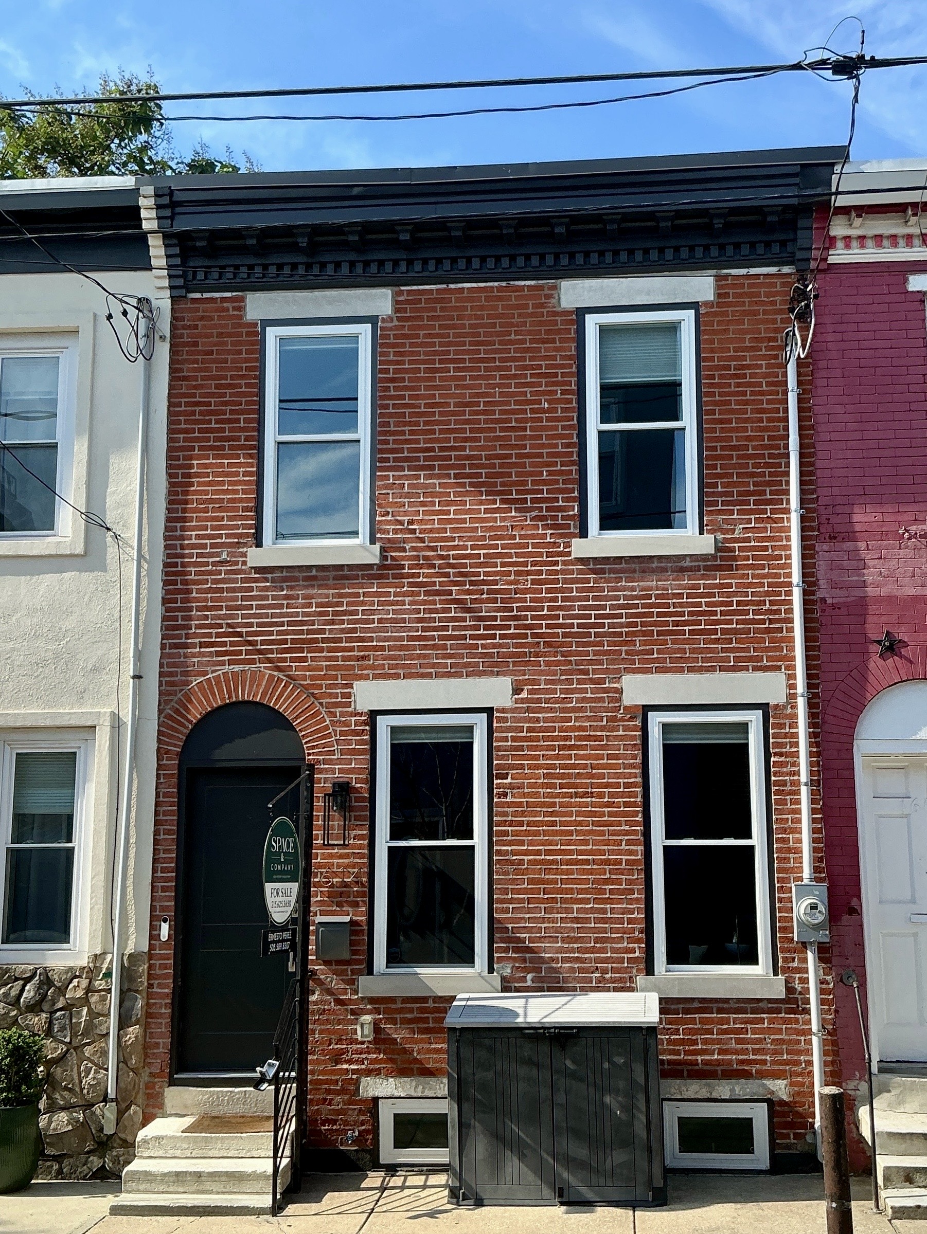Home inspection by Joe Topper — red-brick two-story rowhome with arched doorway in Point Breeze, Philadelphia