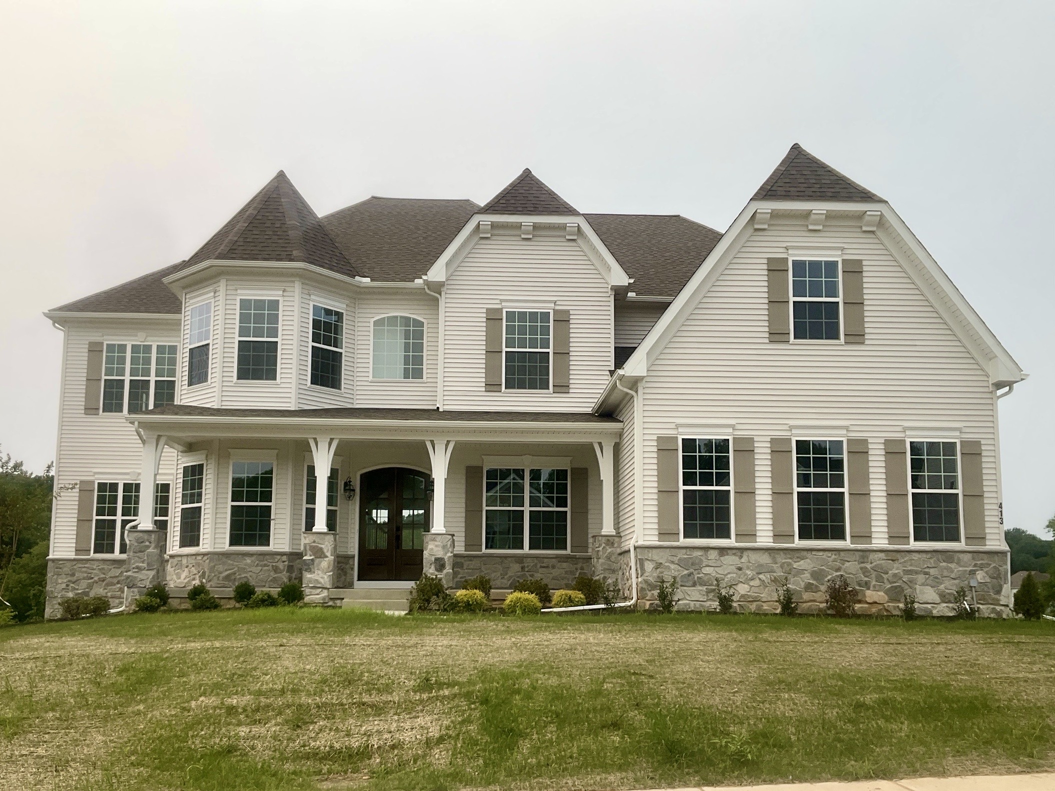 Home inspection by Michael Kelley — new construction colonial with turrets and stone accents in Newtown Square, Pennsylvania