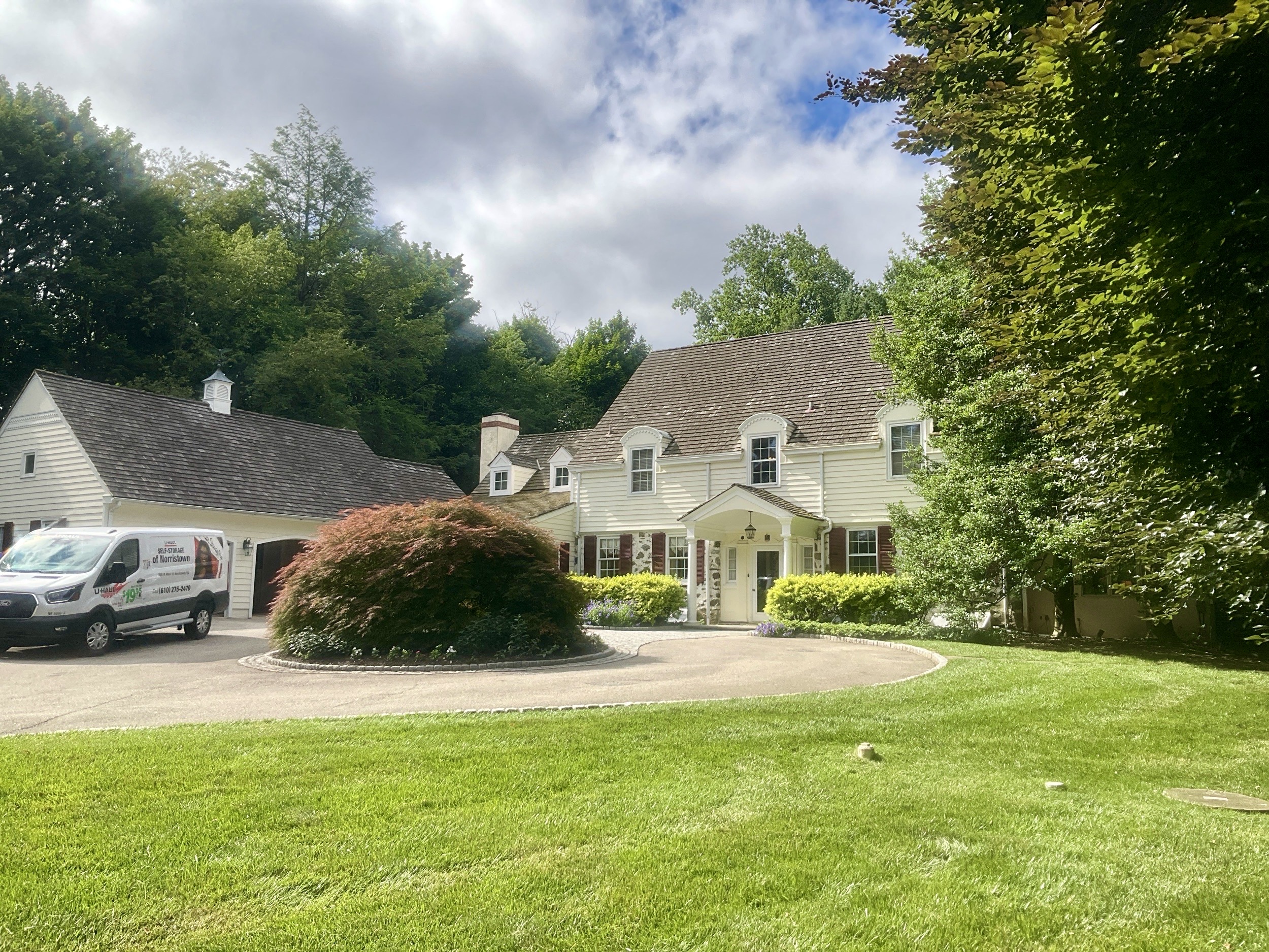 Home inspection by Michael Kelley — white clapboard colonial with cedar-shake roof in Villanova, Pennsylvania