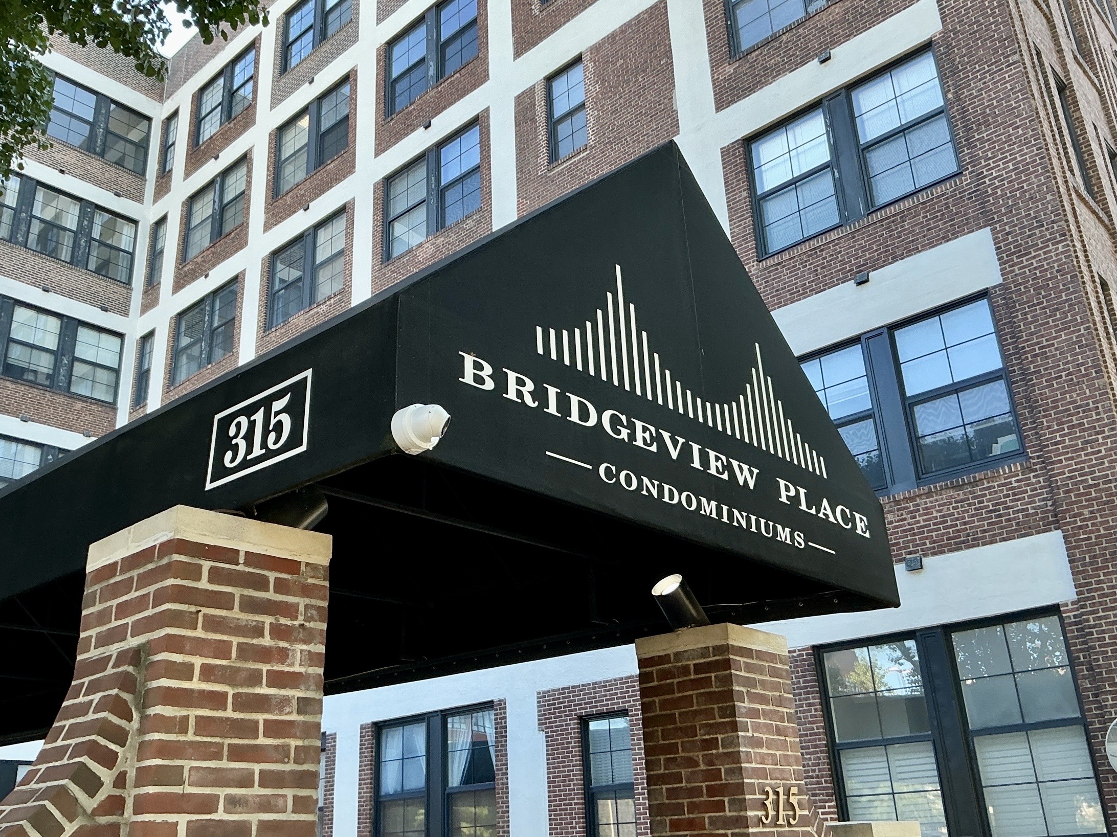 Condominium inspection by David Bollinger — Bridgeview Place Condominiums brick building entrance in Old City, Philadelphia