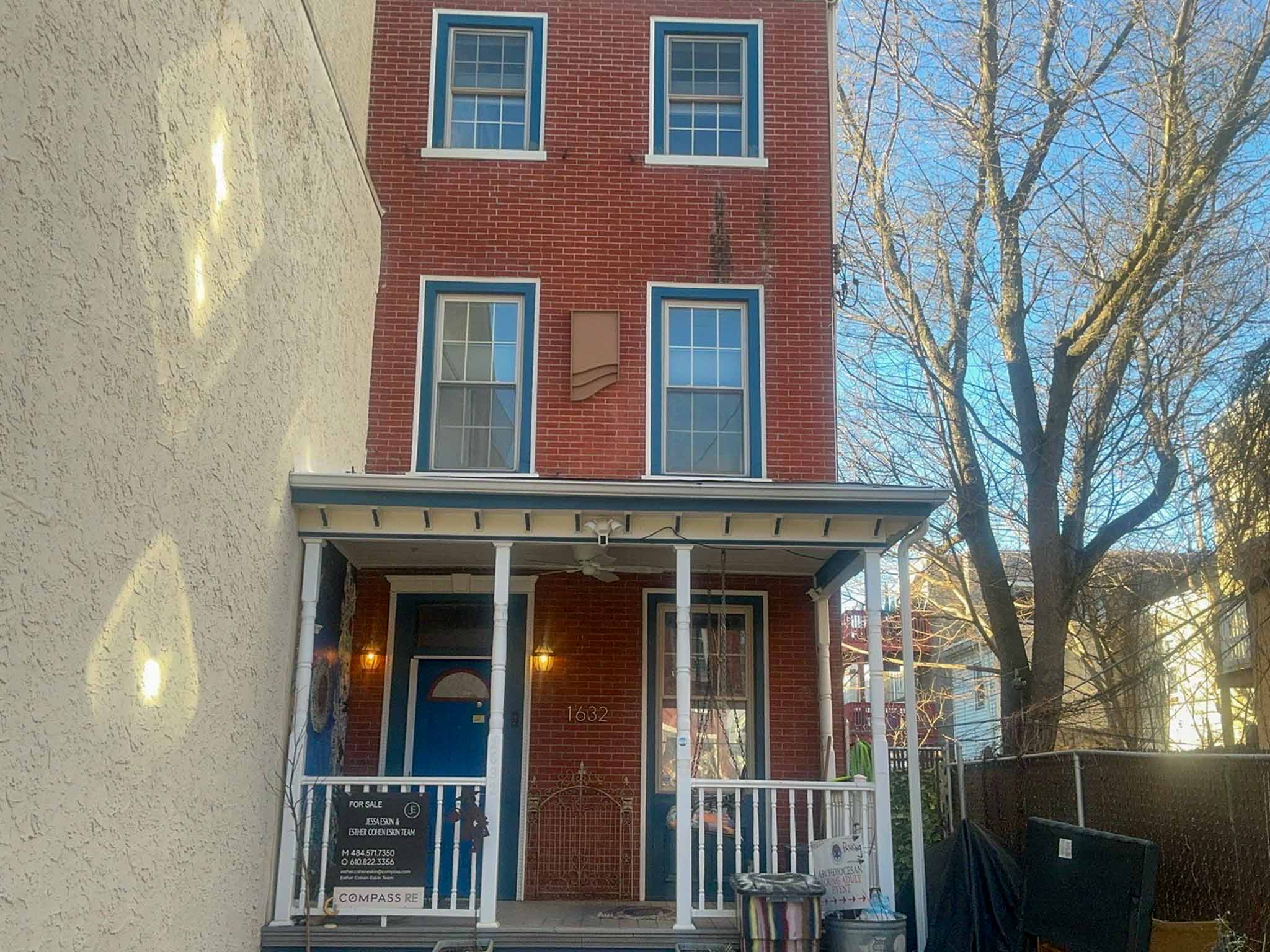 ValueGuard home inspection — Italianate red brick townhome with bracketed cornice and slate mansard in Fairmount Philadelphia