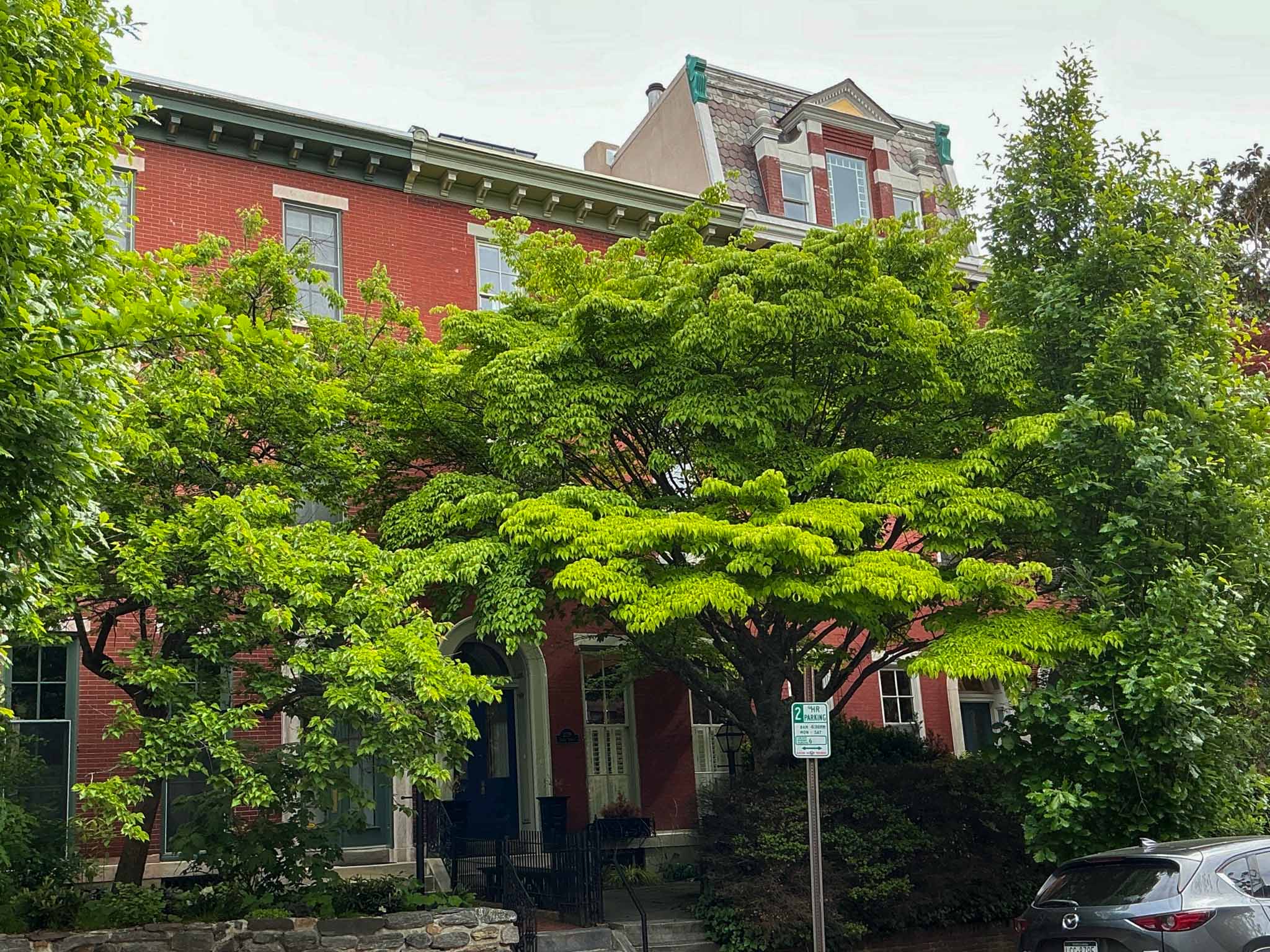 ValueGuard home inspection — mid-1800s Italianate rowhome streetscape with arched doorways in Fairmount Philadelphia