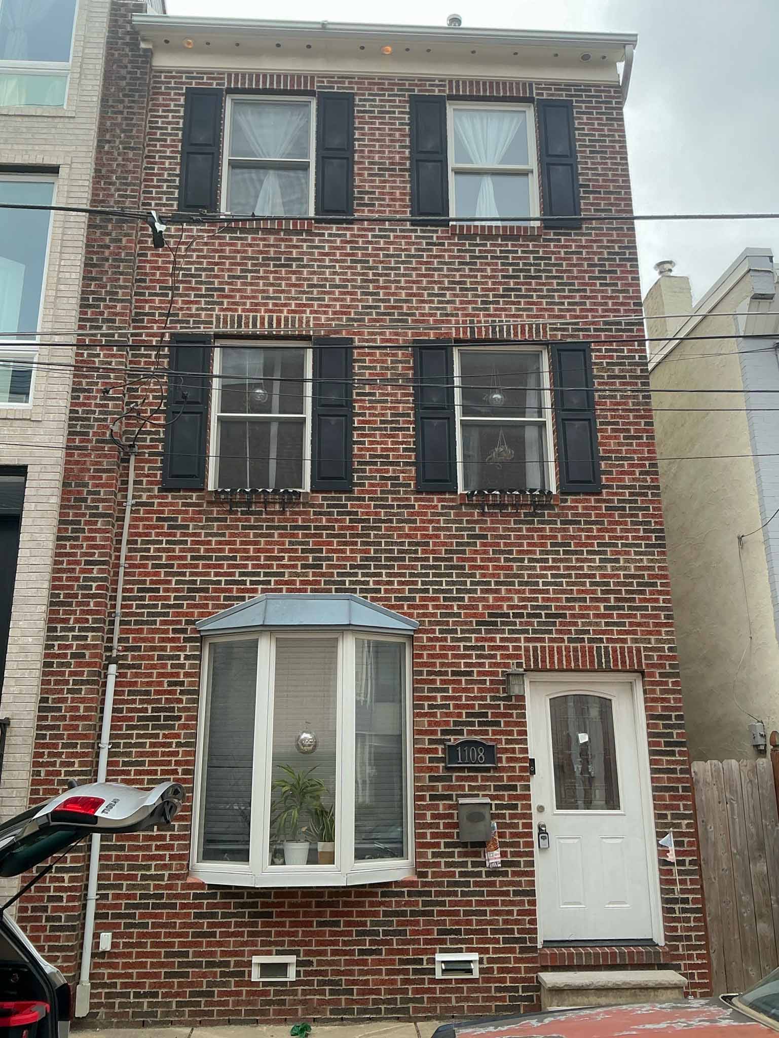 ValueGuard home inspection — three-story renovated brick rowhome with oriel bay window in Fishtown Philadelphia