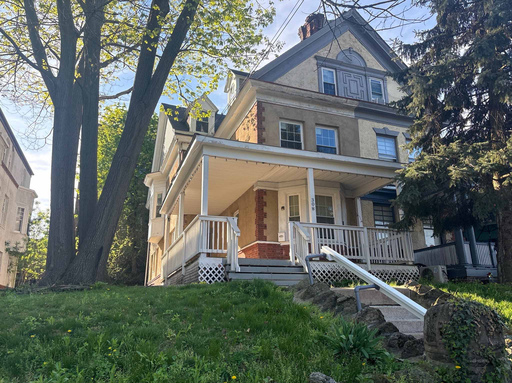 ValueGuard home inspection — stucco and brick Colonial Revival twin on elevated lot in Germantown Philadelphia
