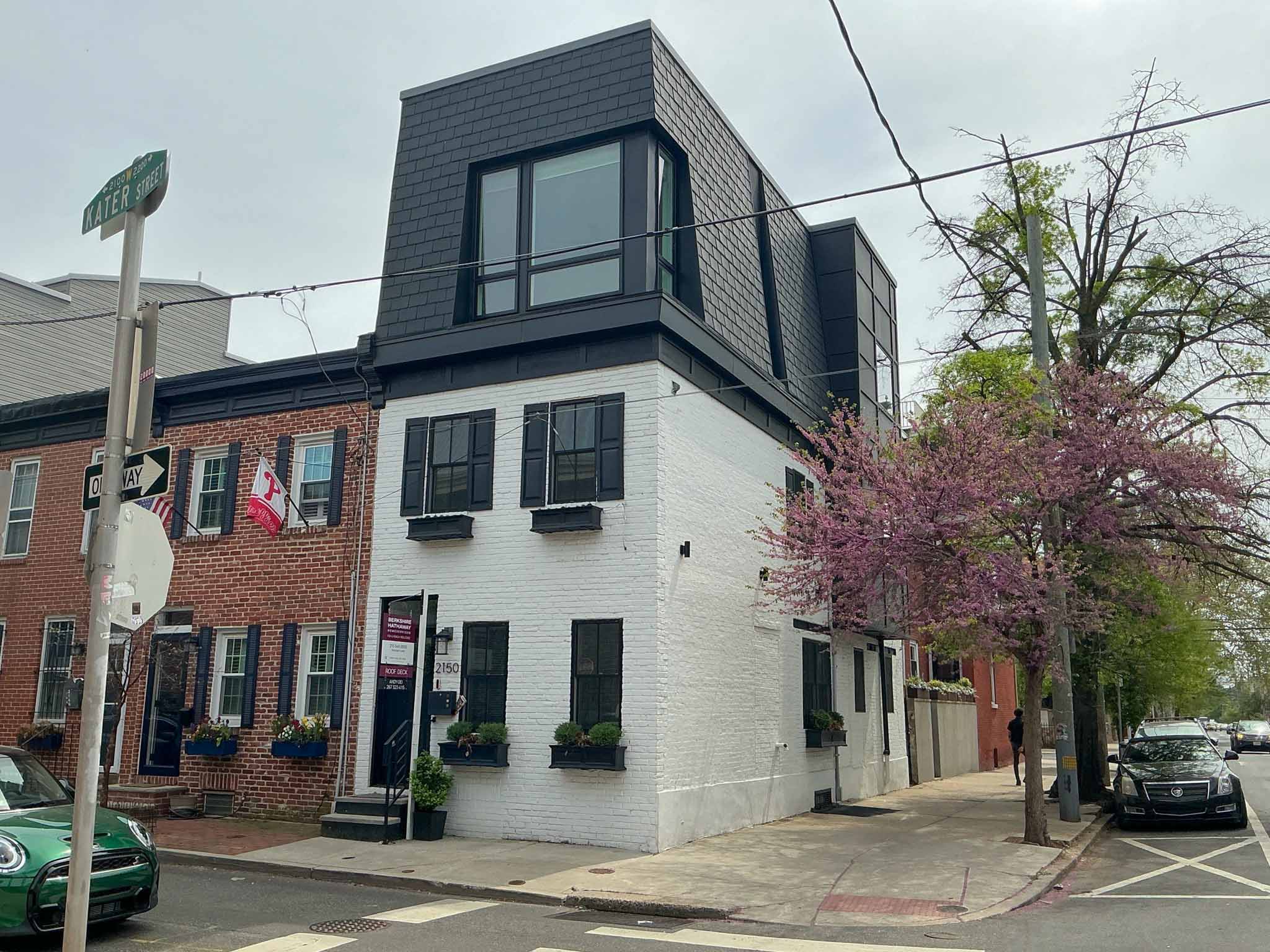 ValueGuard home inspection — restored three-story brick rowhome next to historic stone church in Graduate Hospital Philadelphia