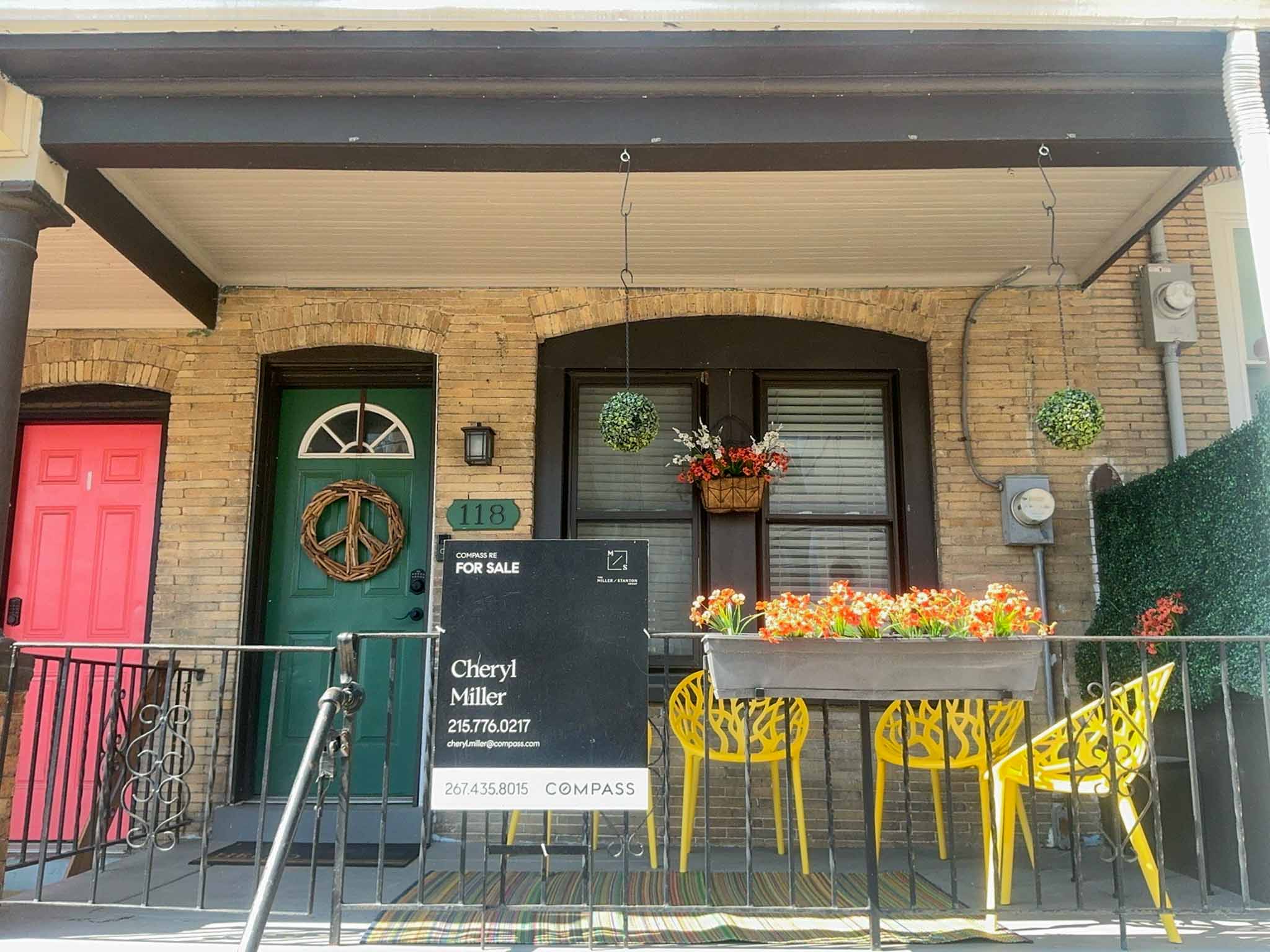 ValueGuard home inspection — buff brick worker rowhome with covered porch in Manayunk Philadelphia