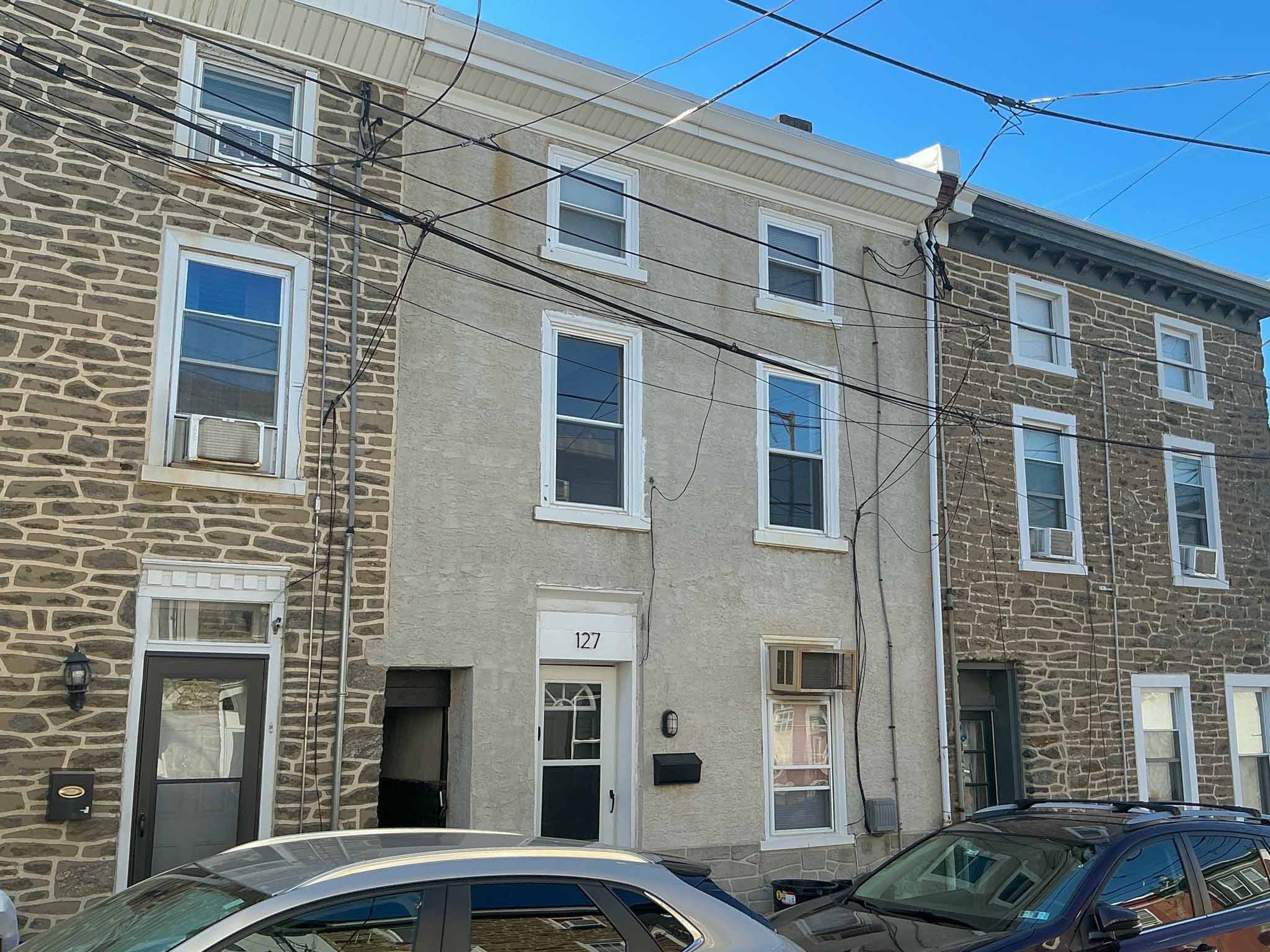 ValueGuard home inspection — Wissahickon schist rowhome with stuccoed center in Manayunk Philadelphia