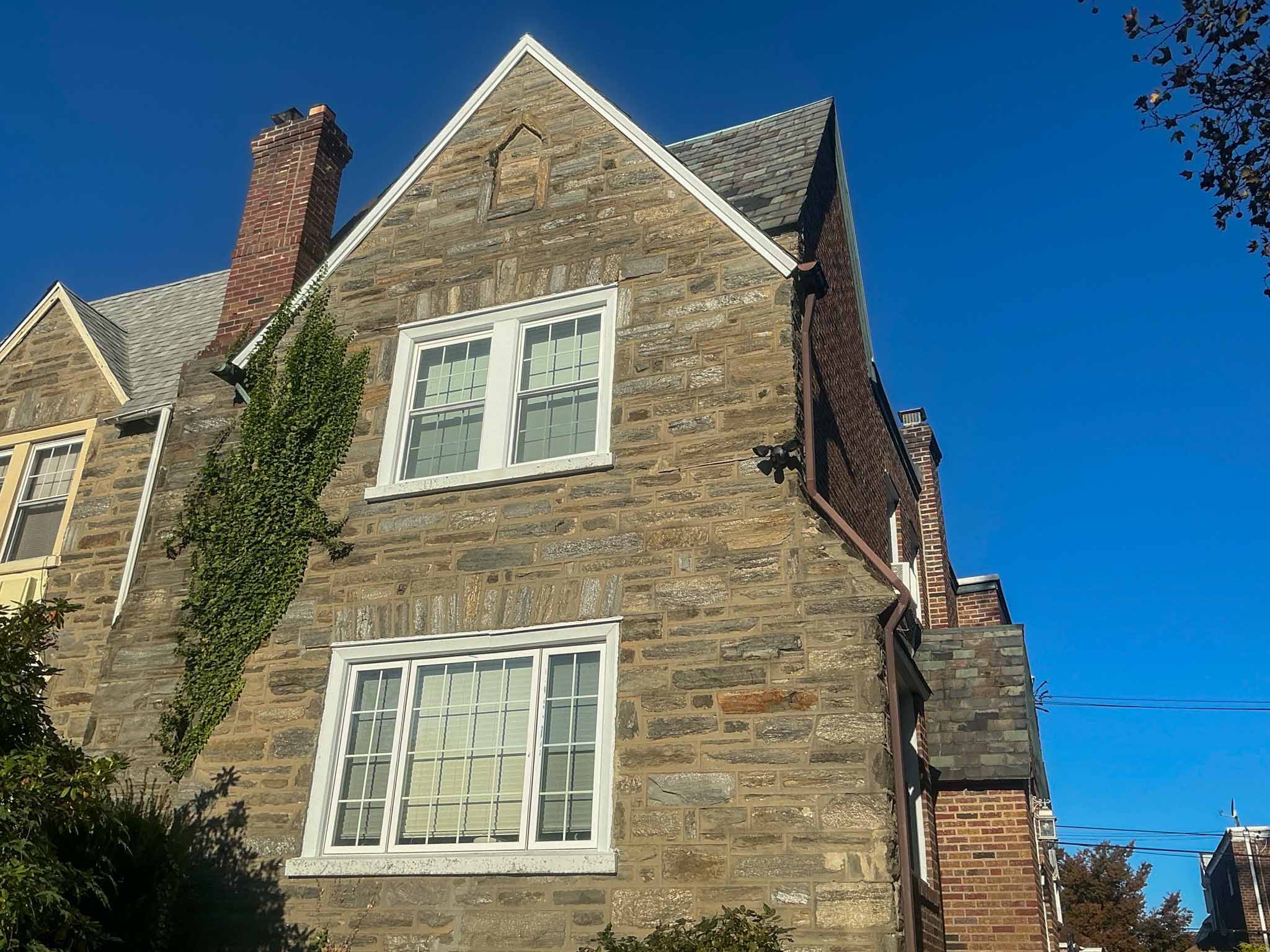 ValueGuard home inspection — Tudor-style Wissahickon stone twin with steep gable in Mt. Airy Philadelphia