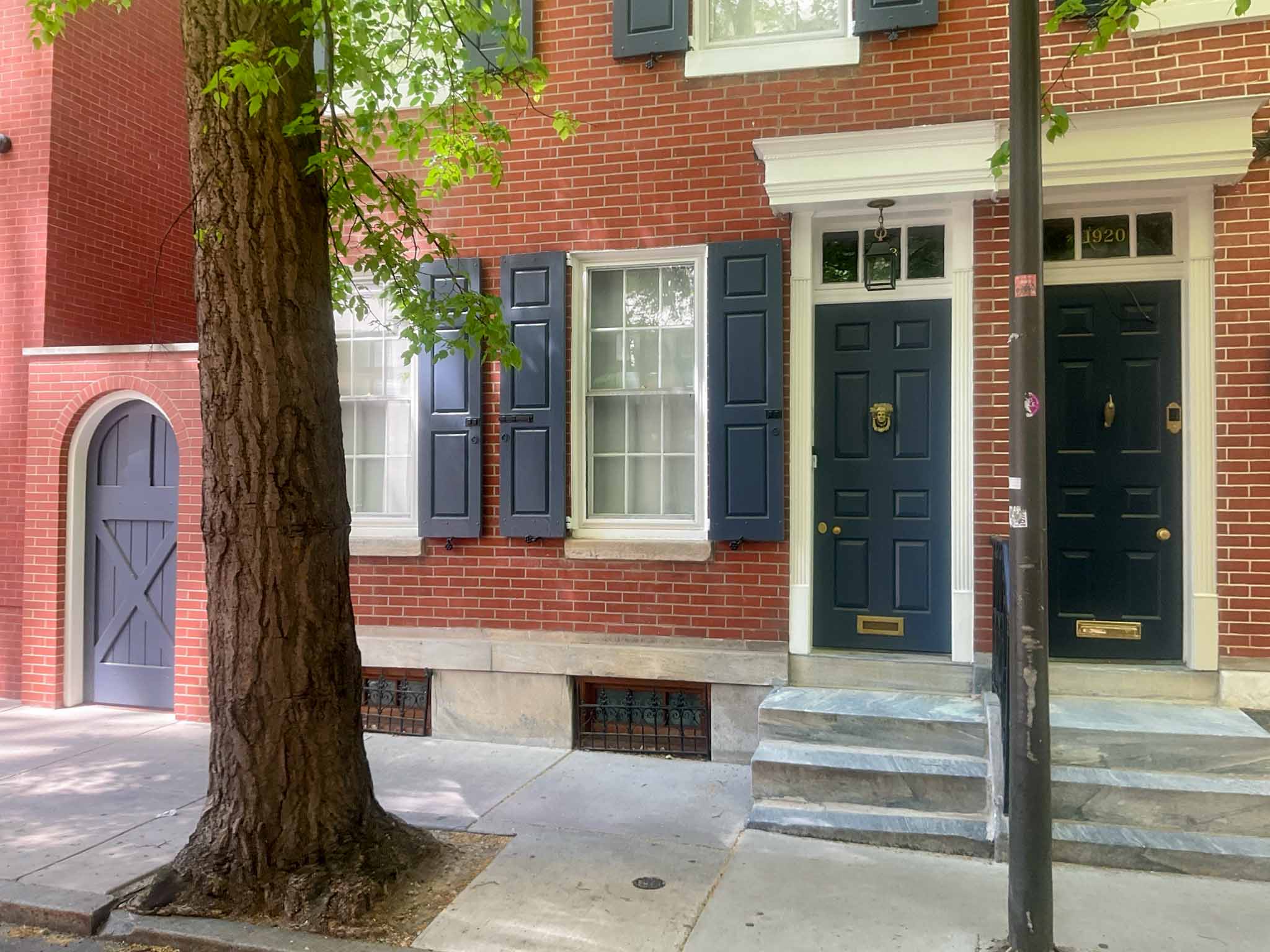 ValueGuard home inspection — renovated brick rowhome with green louvered shutters in Rittenhouse Square Philadelphia