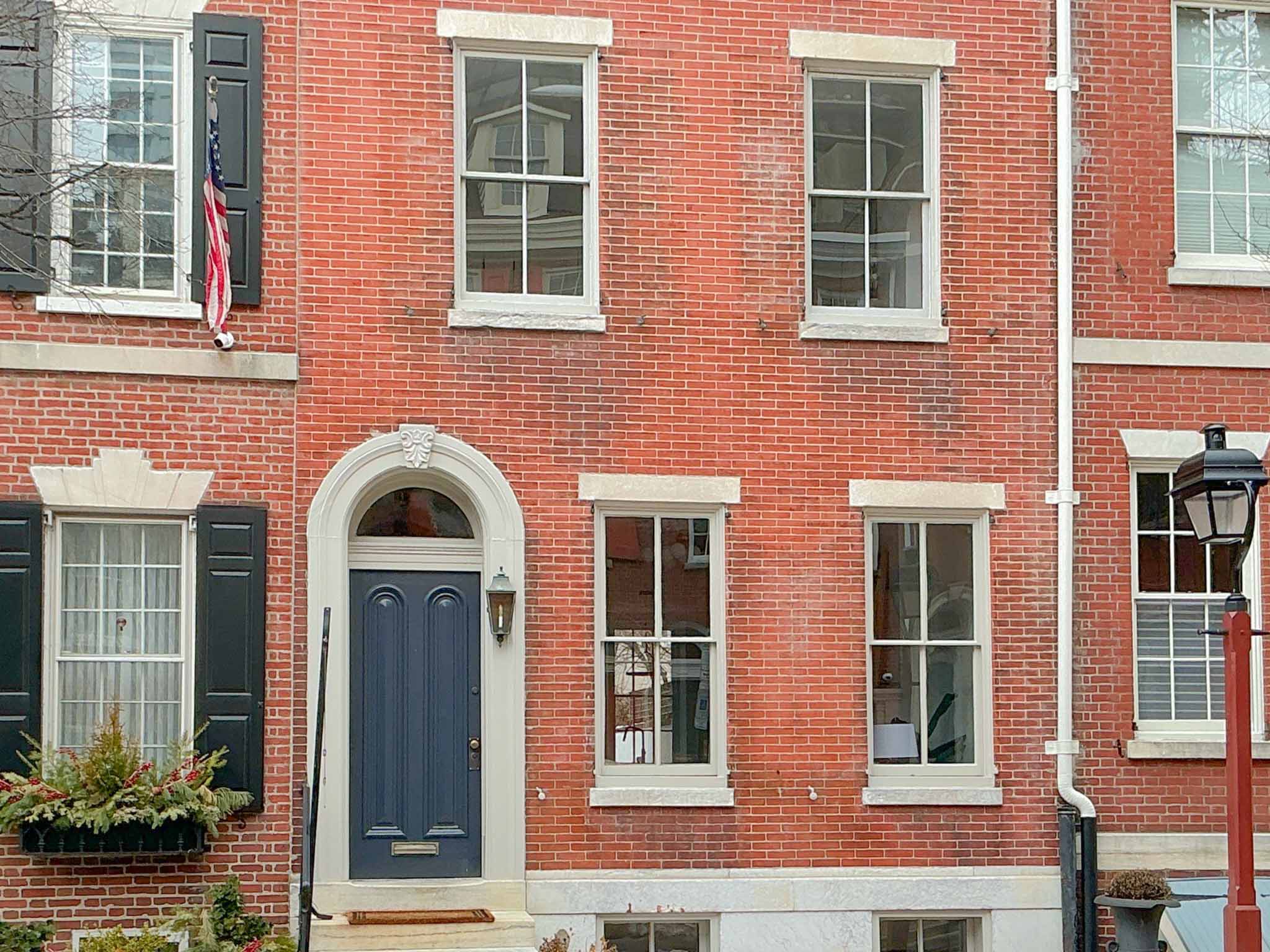 ValueGuard home inspection — Federal-era brick rowhome with arched fanlight doorway in Society Hill Philadelphia