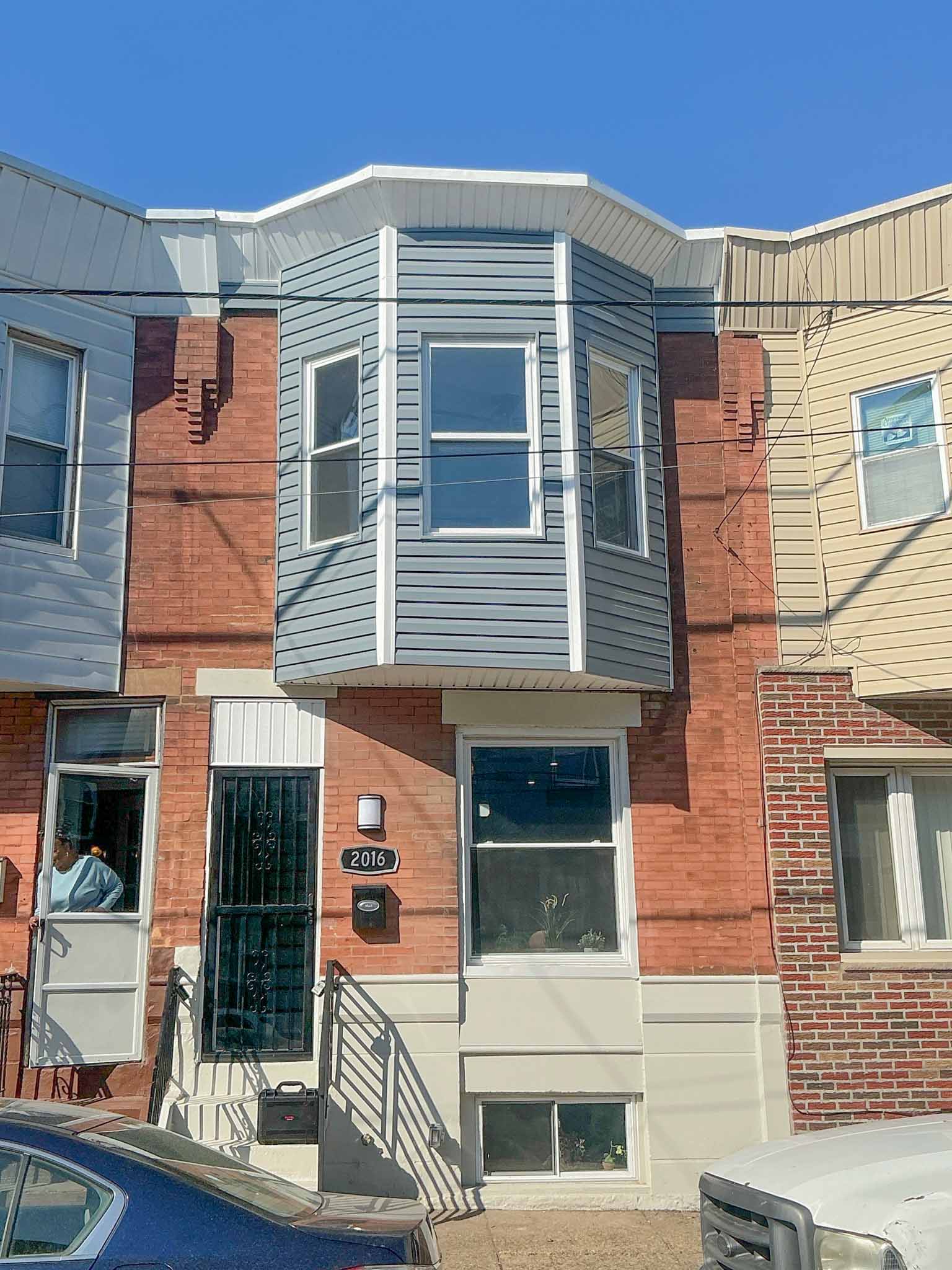 ValueGuard home inspection — brick rowhome with vinyl-clad bay-window retrofit in South Philadelphia