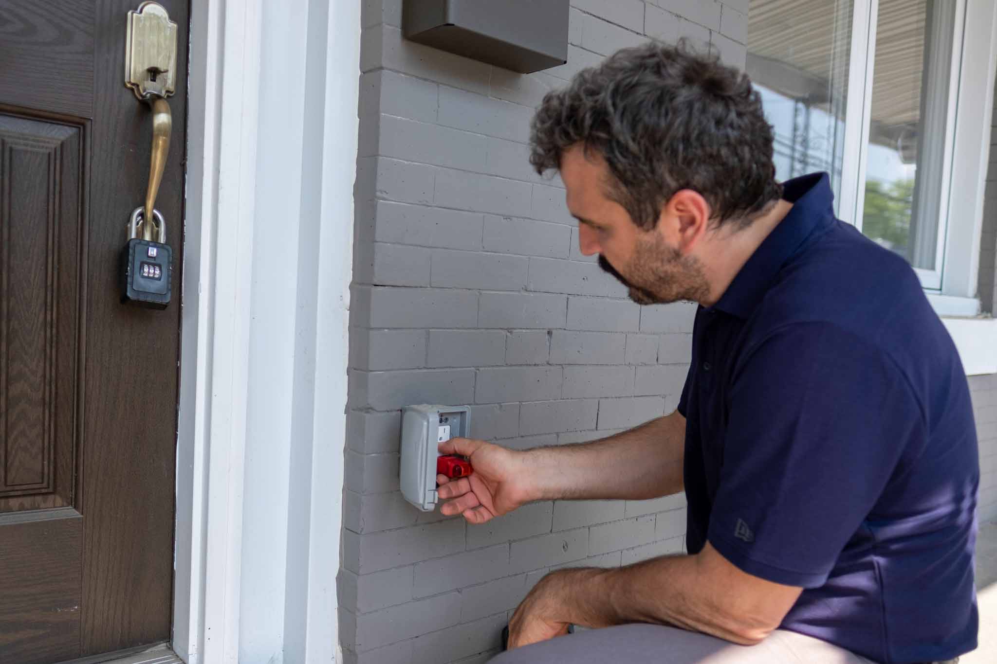 ValueGuard home inspector testing an exterior electrical outlet during a home inspection in Greater Philadelphia