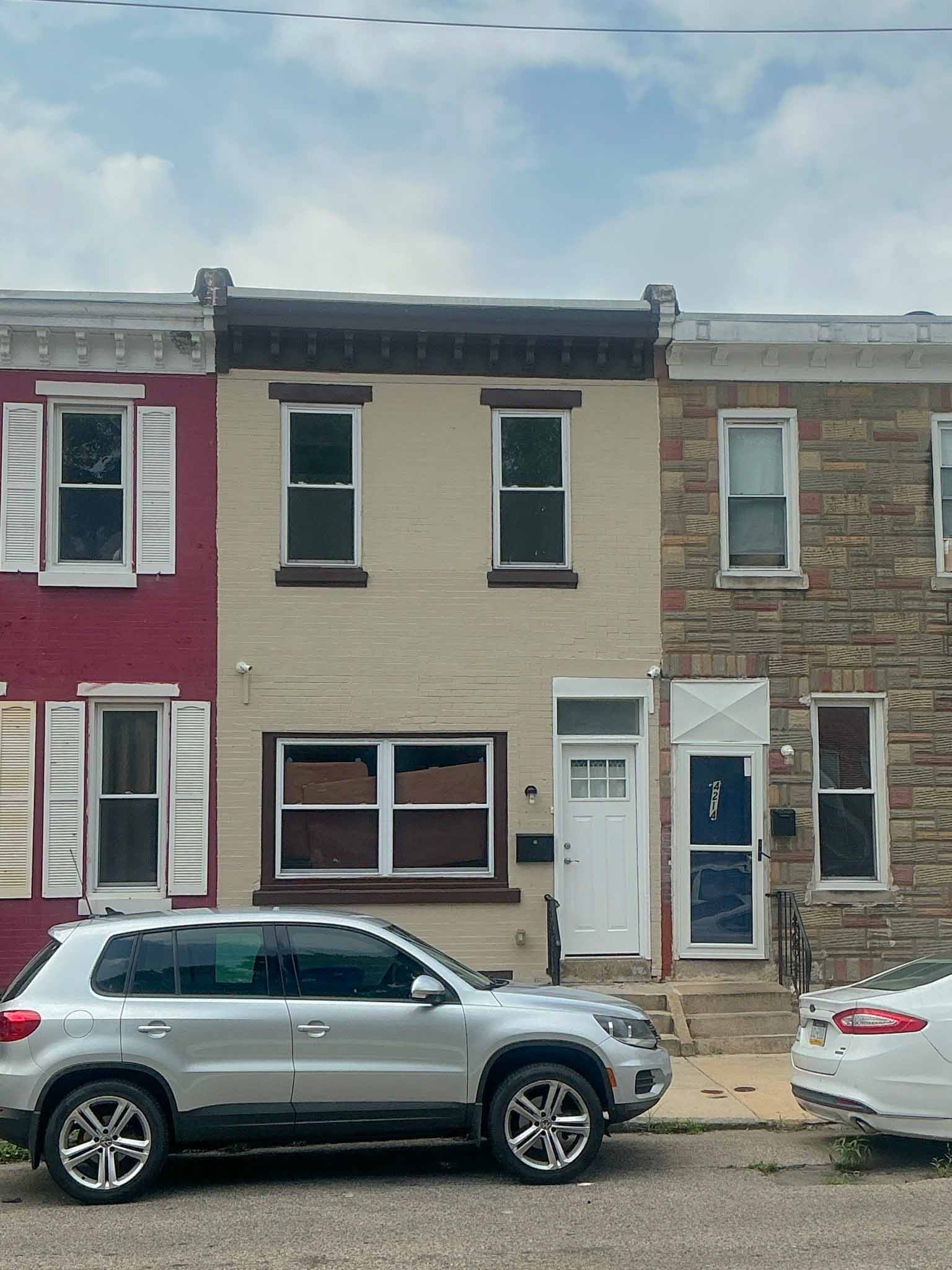 ValueGuard home inspection — Victorian porch-front rowhome with ornate millwork and decorative columns in West Philadelphia