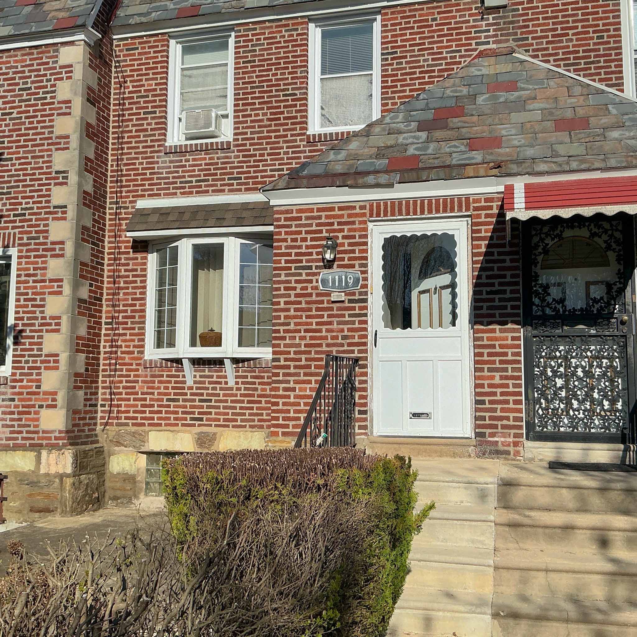 ValueGuard home inspection — brick twin with slate-roofed entry and bay window in Cedarbrook Philadelphia
