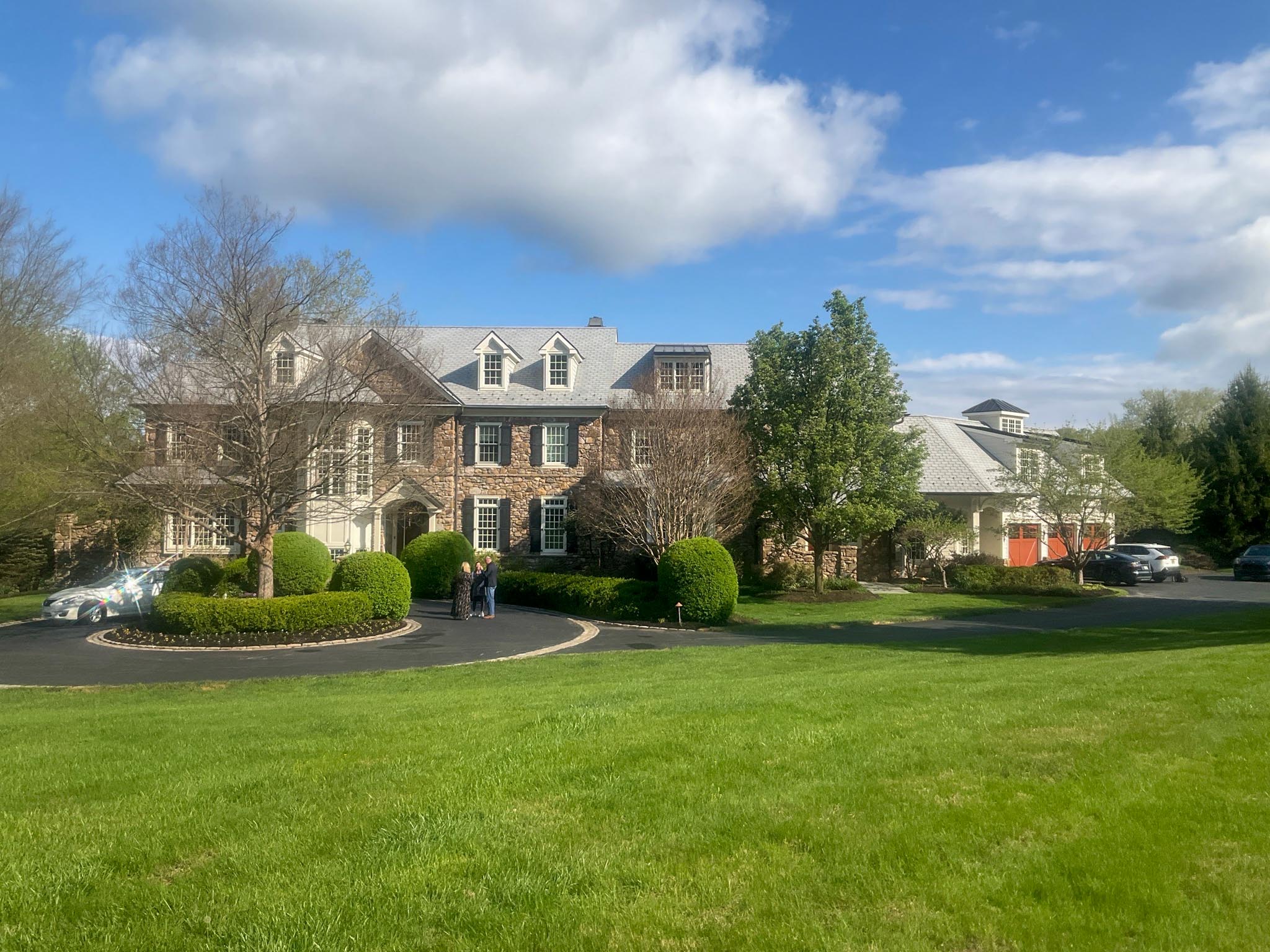 Stone colonial estate with an attached carriage house and cupola during a ValueGuard home inspection in Malvern, Chester County, on the Main Line