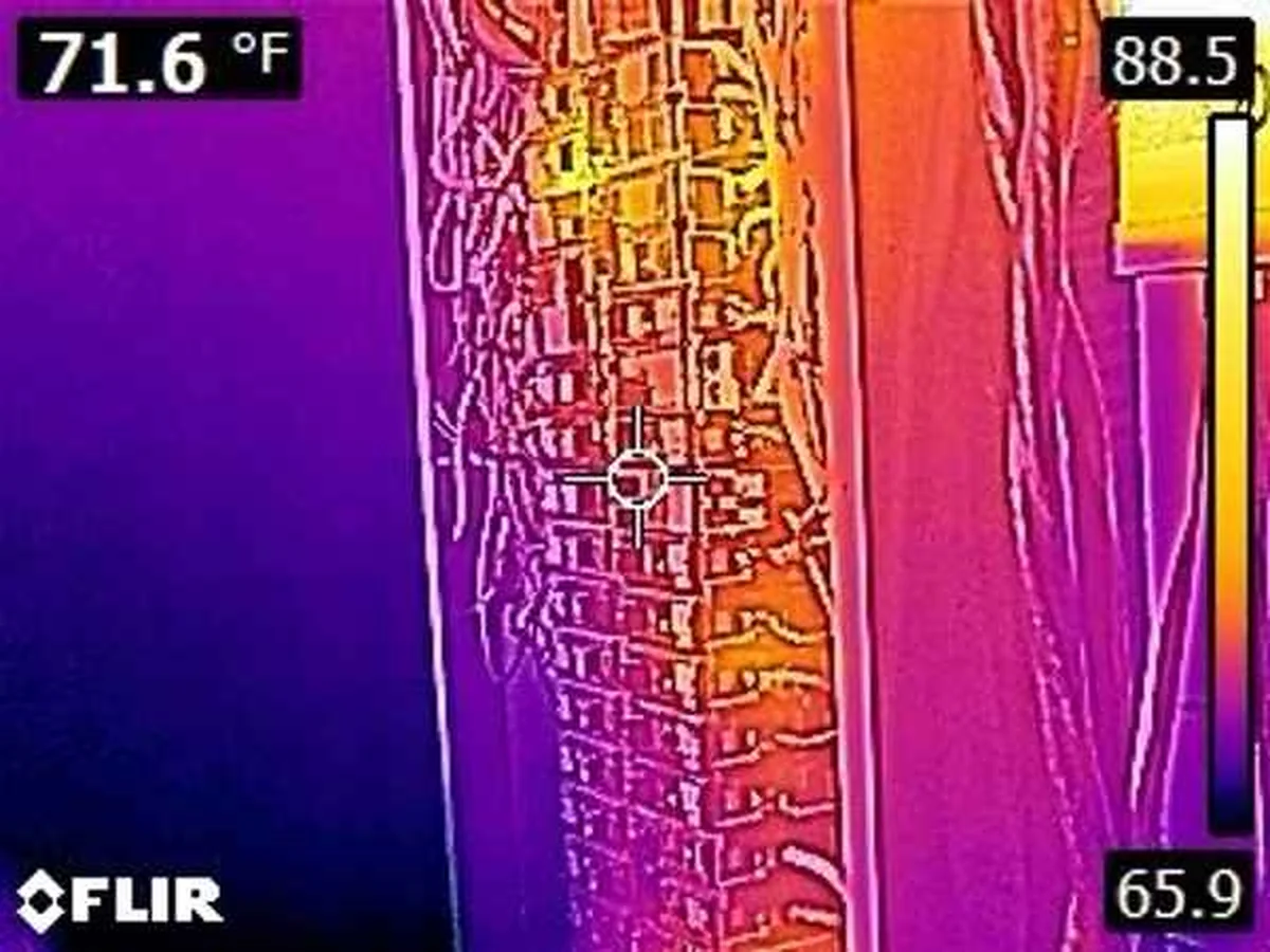 Infrared thermal scan of a residential electrical service panel included in a home inspection report