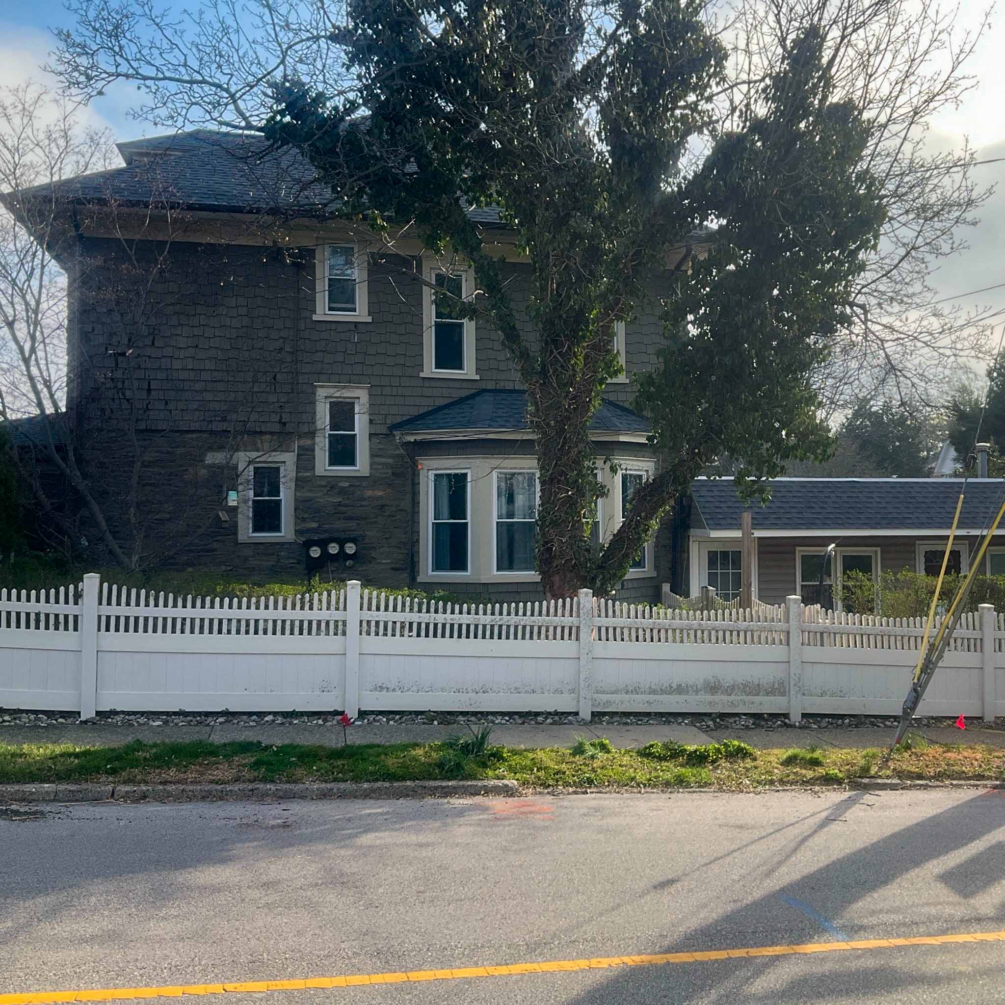 Jenkintown Home Inspection — Shingle-Sided Victorian Foursquare Three-story cedar-shake Victorian foursquare in Jenkintown with a slate hip roof inspected by a ValueGuard home inspector