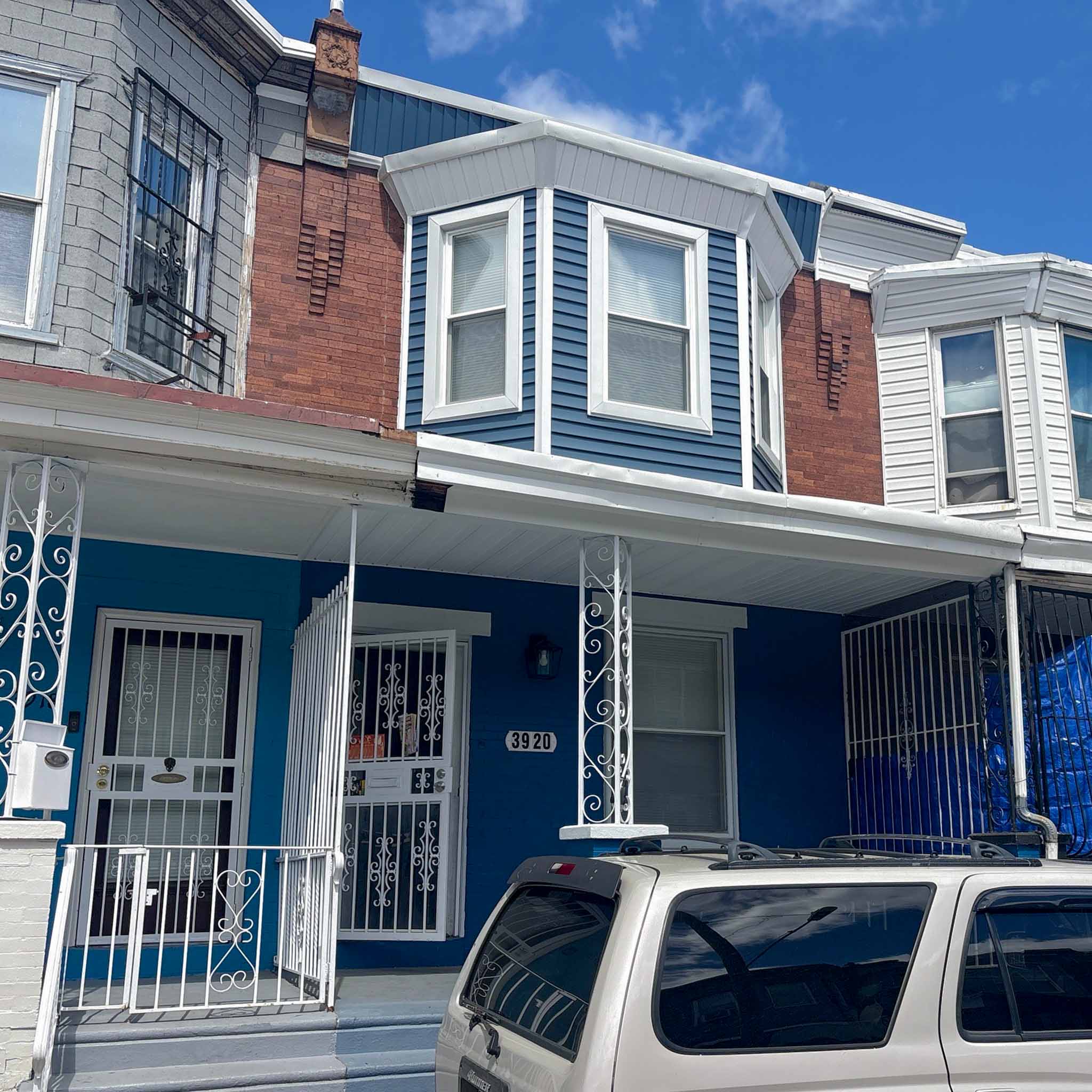 ValueGuard home inspection — porch-front brick rowhome with second-floor bay window in Nicetown-Tioga Philadelphia