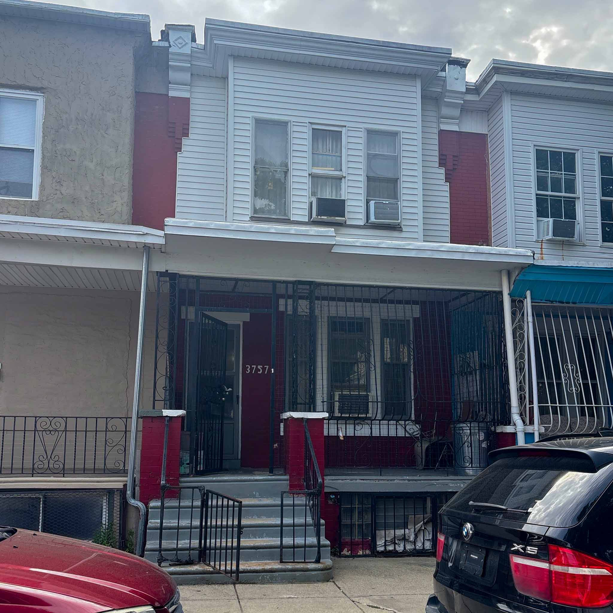 ValueGuard home inspection — classic porch-front rowhome with decorative cornice in Nicetown-Tioga Philadelphia