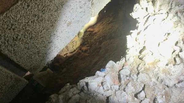 Incomplete crawlspace vapor barrier with exposed soil documented during a Delaware County home inspection